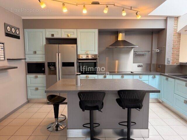 Maison à QUIEVRECHAIN