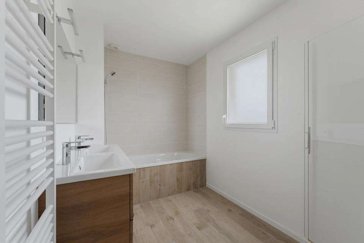 Maison de 4 pièces de 100 m² à Ambarès-et-Lagrave - photo 11
