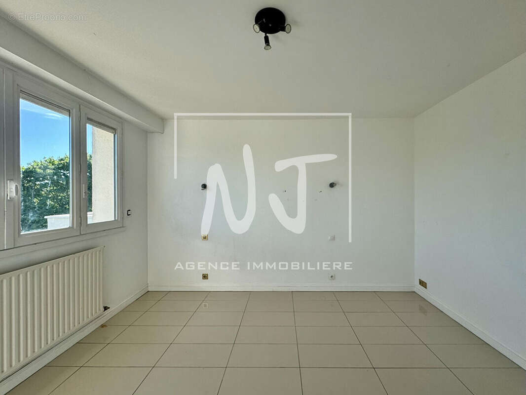 Appartement lumineux à vendre à Angers (quartier Madeleine) avec terrasse - photo 7