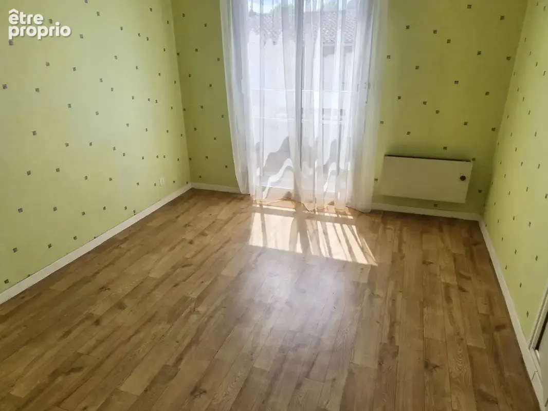 Appartement T3 - 71m2 + balcons, garage et cave - photo 7