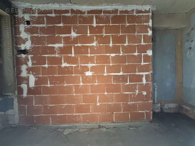 EXCLUSIVITE à AUTUN, Plateau de 65m2 en RDC à aménager avec garage et courette. - photo 5