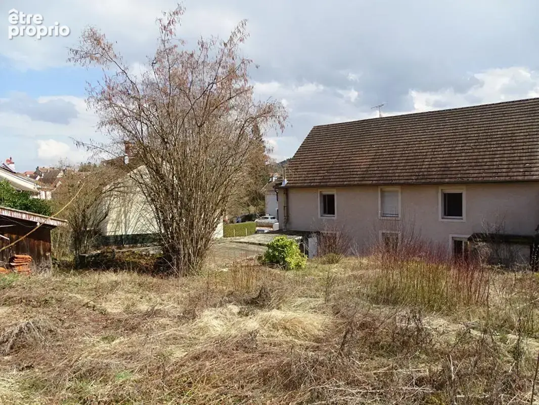 Immeuble comprenant 4 appartements + caves, jardin et parkings - photo 8