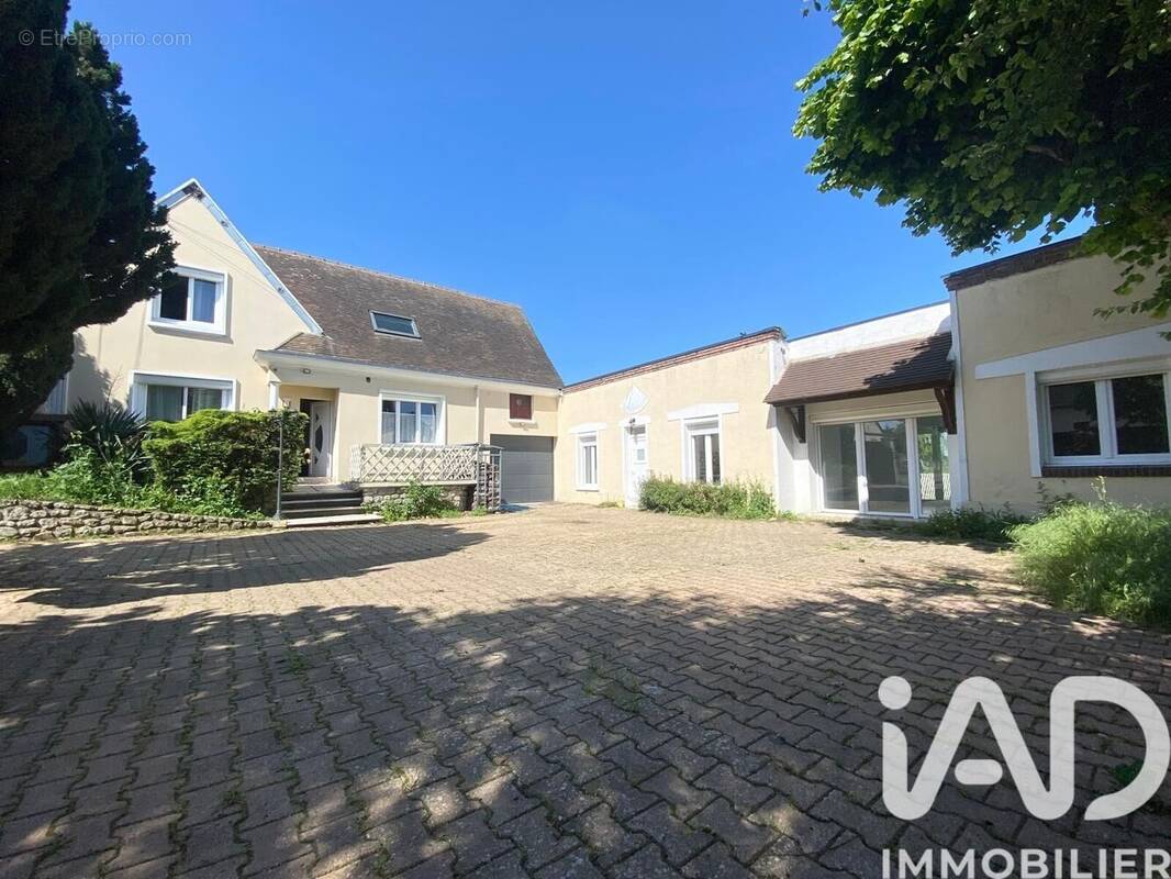 Photo 1 - Maison à TREMBLAY-LES-VILLAGES