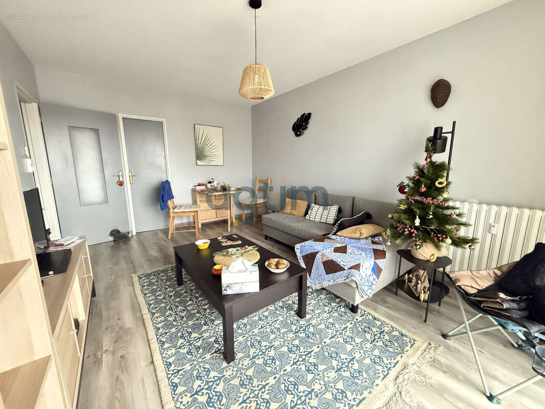 Centre-ville Montaigu, au 2e avec ascenseur, T3, 49,45 m2 habitables, cave, parking - photo 3