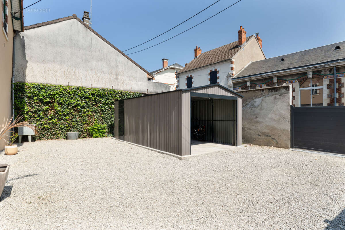 Maison centre ville - photo 11