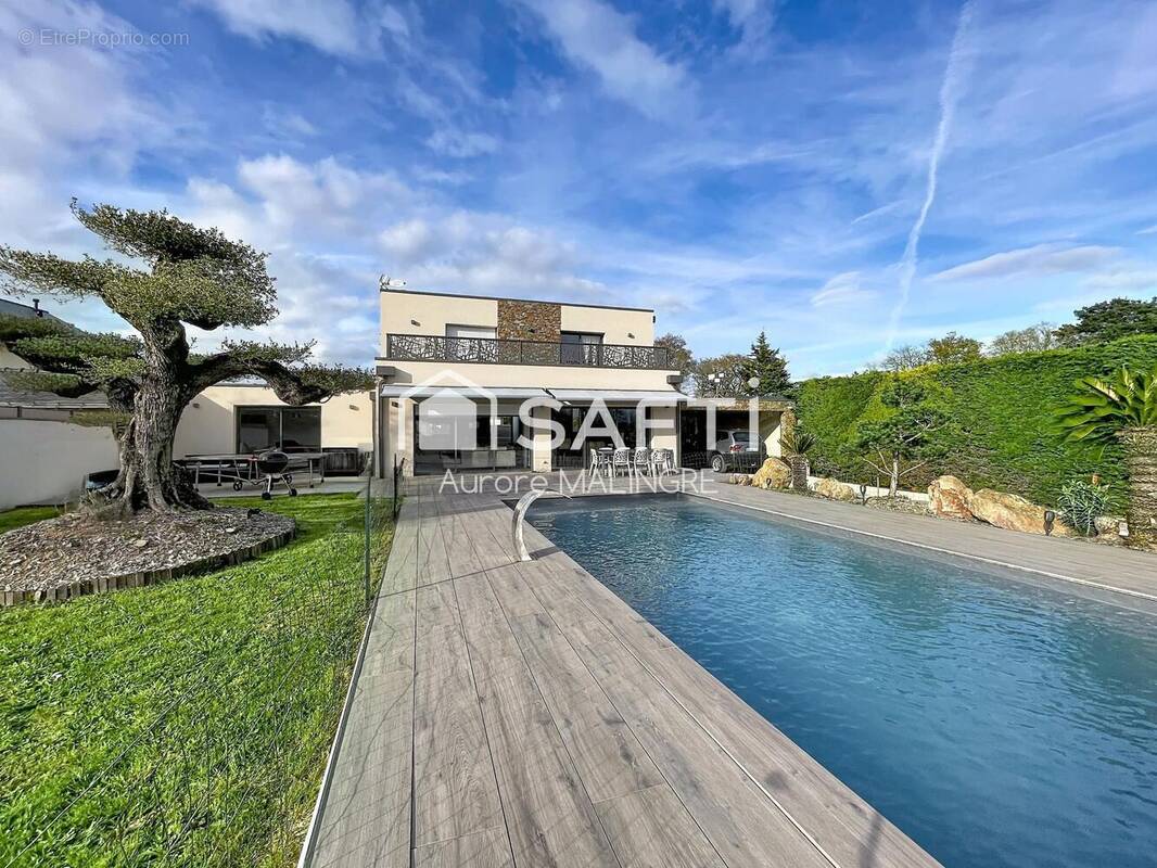 Photo 1 - Maison à TREILLIERES