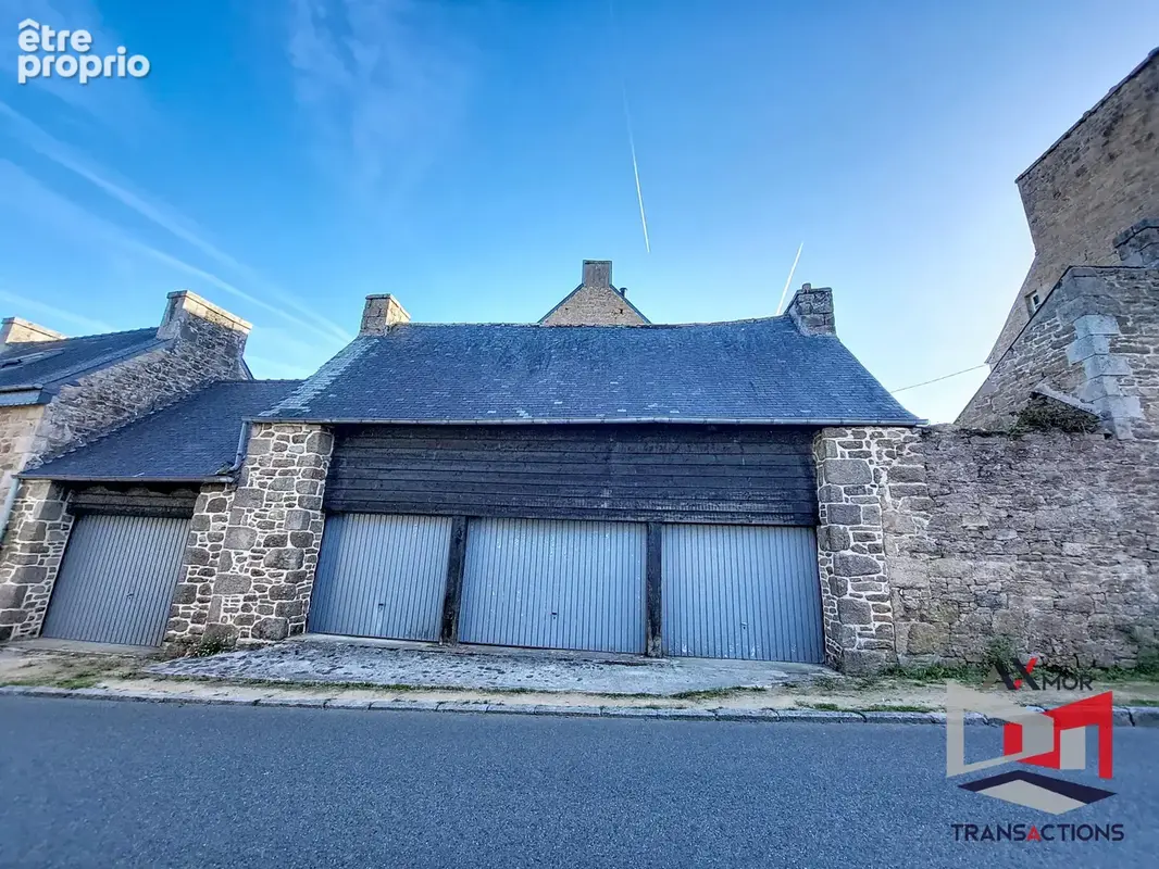 Ensemble de 4 garages à proximité immédiate du bourg - photo 2