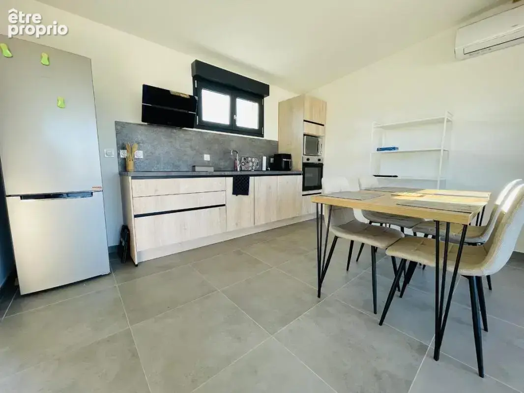 Appartement F3 - photo 2