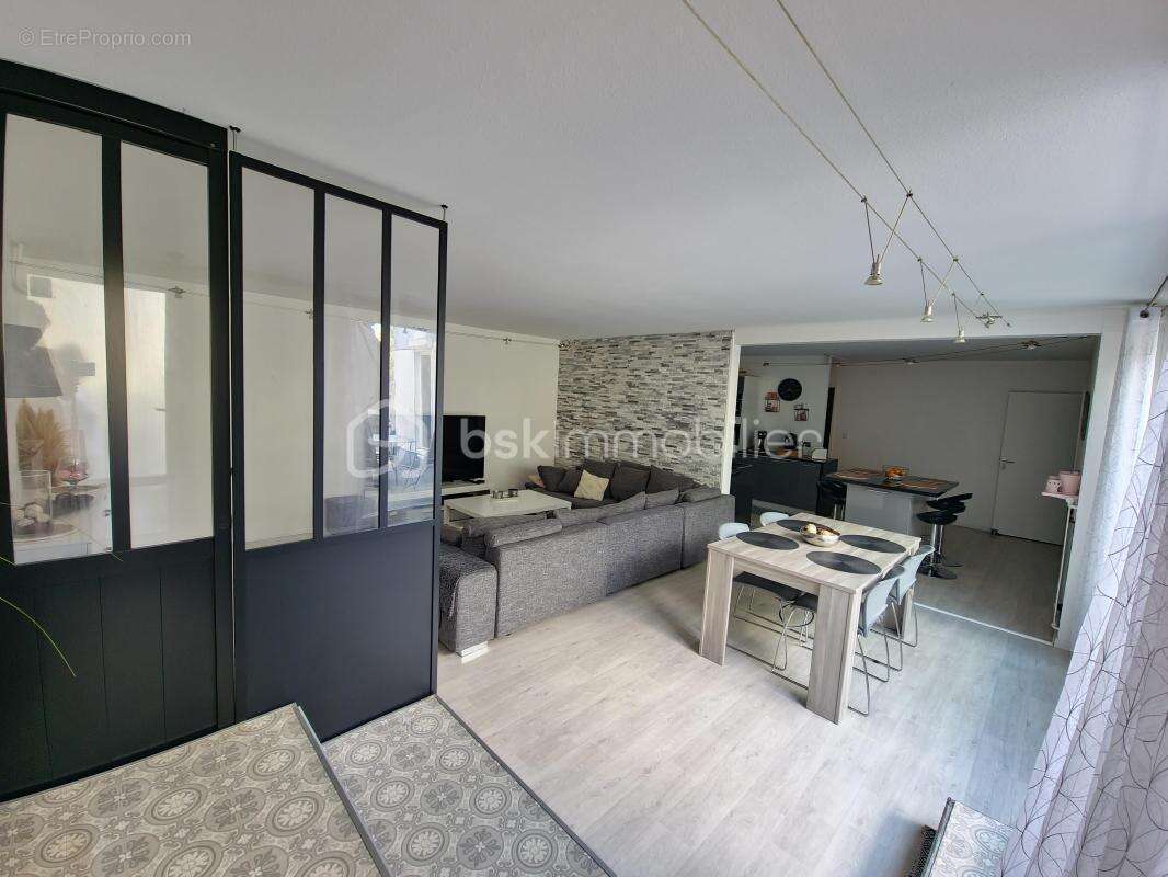 Appartement en rc de 124m² utile avec terrasse de 34m² -vue degagee- 5p lumineux et en parfait etat - photo 3