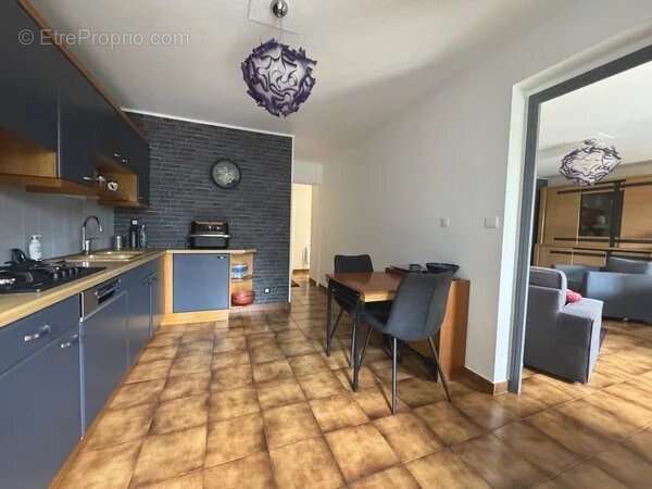 Appartement en rez-de-jardin avec garage et cave - photo 6