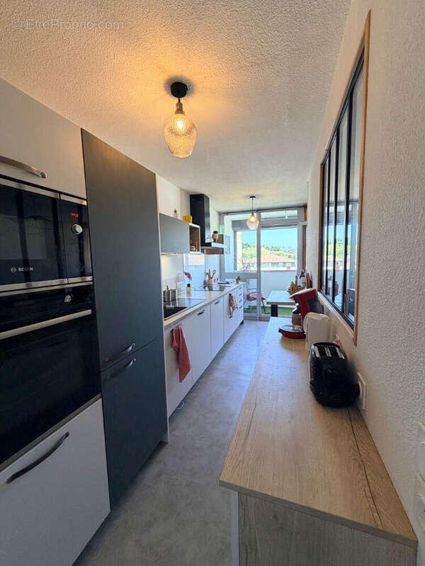 Appartement Aurillac de type 3 au dernier étage avec ascenseur et stationnement - photo 3
