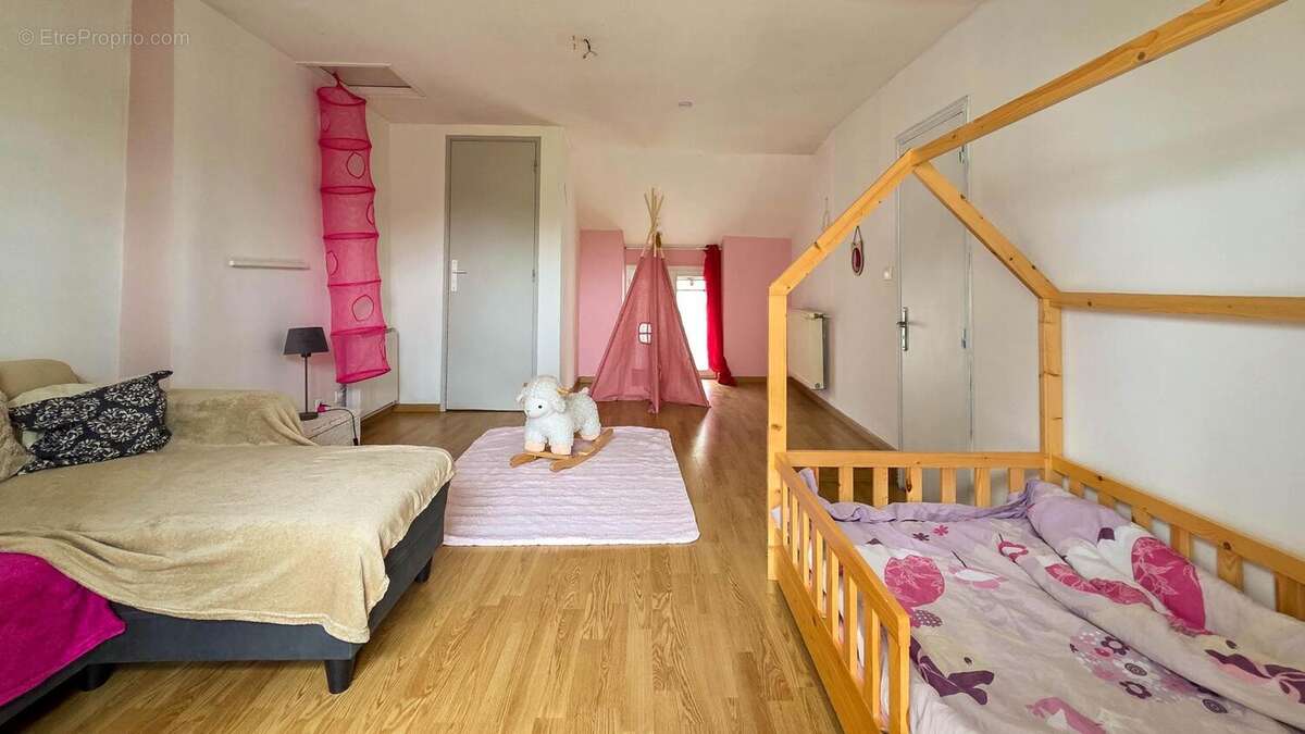 Maison 124 m² à La Breille-Les-Pins  - photo 6