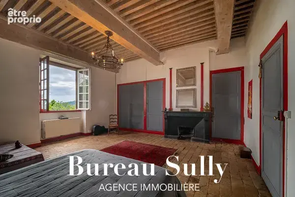 POLEYMIEUX-AU-MONT D'OR - Belle maison de caractère en pierres dorées T4 de 200m2 avec nombreuses dépendances - photo 7