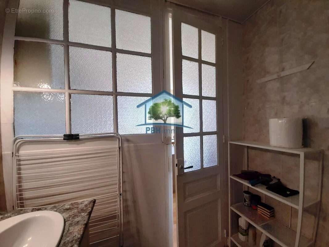 F2 meublé et équipé avec box – centre-ville - photo 6