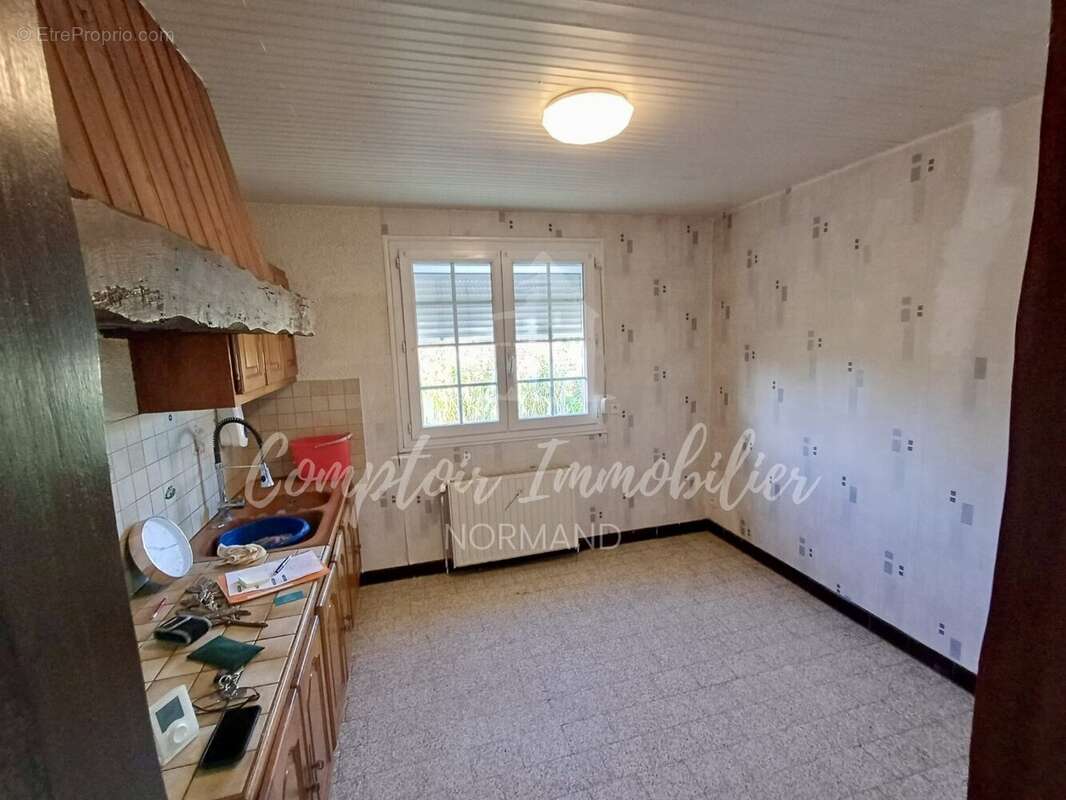 Maison à THIL-MANNEVILLE