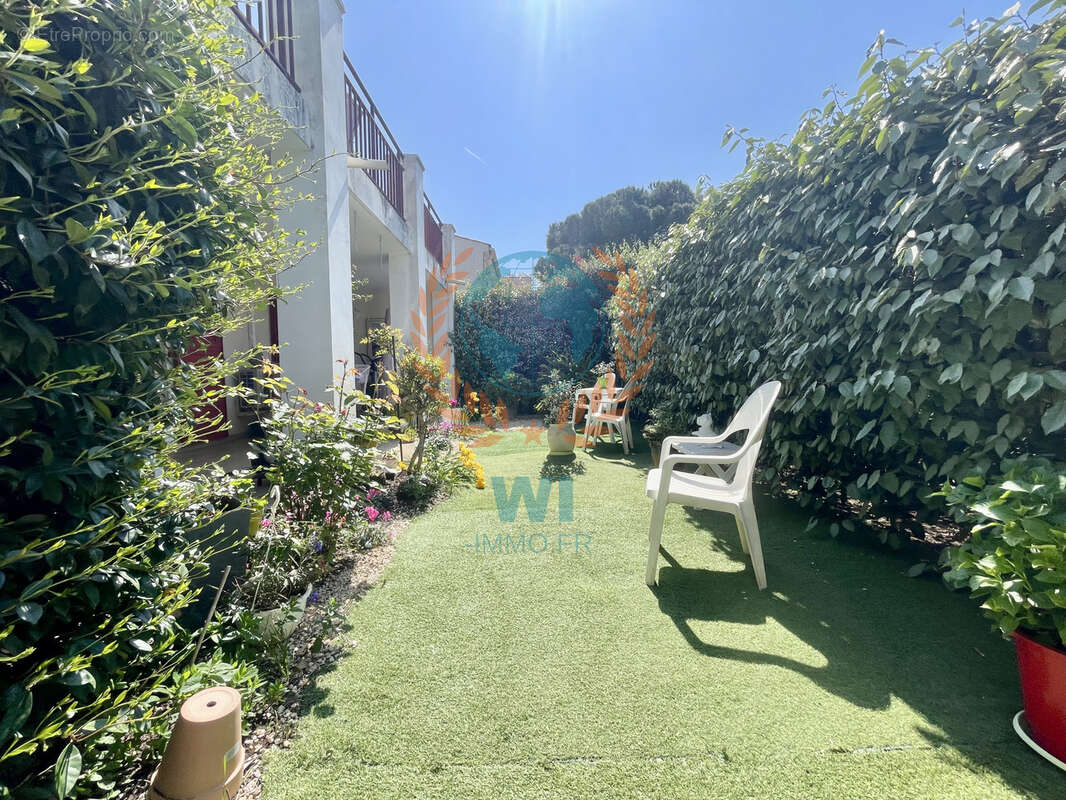 Appartement  en rez-de-jardin avec piscine et garage - photo 9