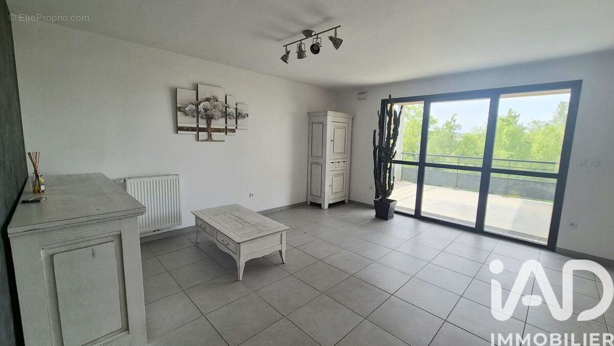 Photo 2 - Appartement à ANDREZIEUX-BOUTHEON