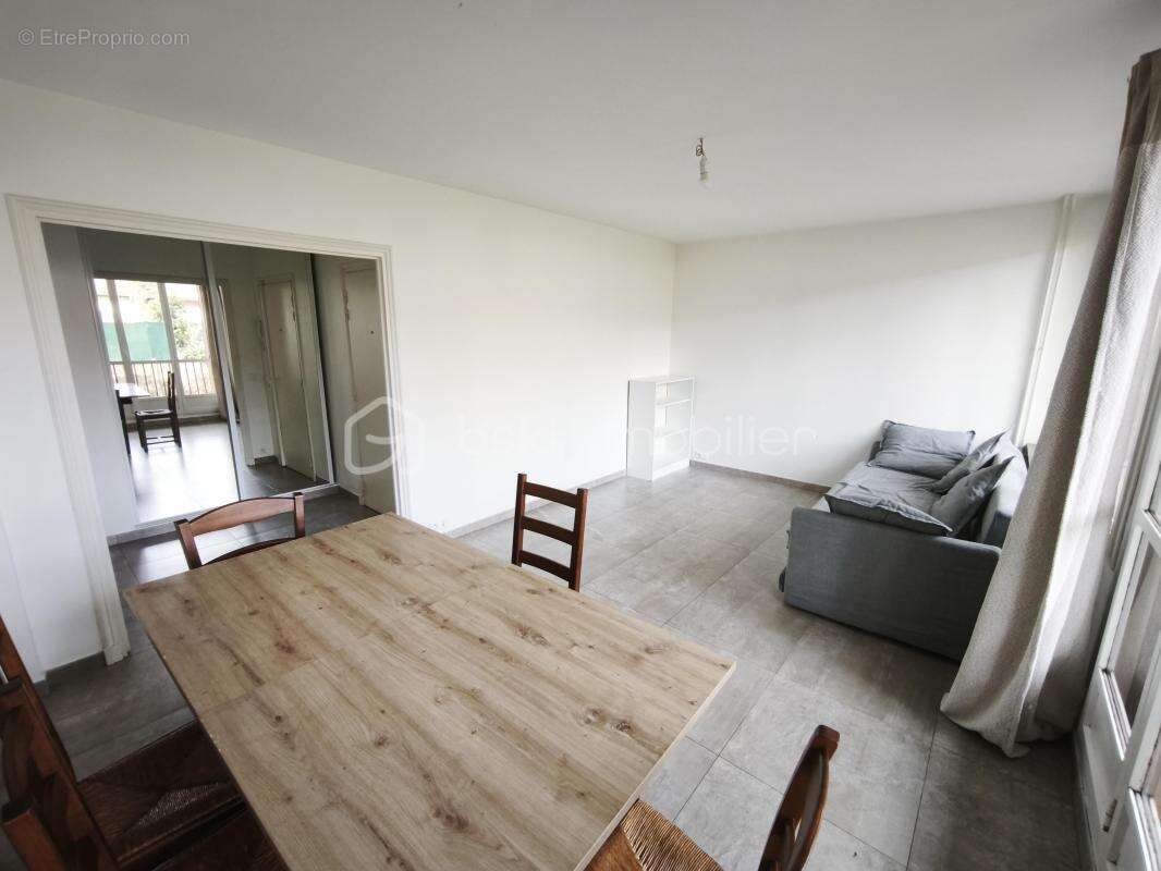 Appartement 3 pièces de 65m² avec balcon, parking et cave - photo 3