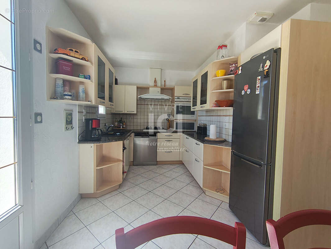 Maison familiale de 125 m² avec sous-sol complet - photo 4
