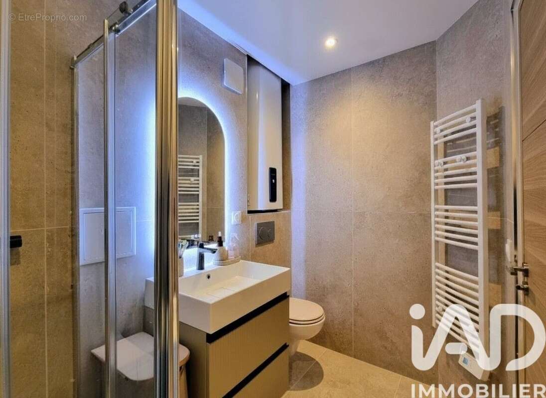 Photo 9 - Appartement à COURBEVOIE