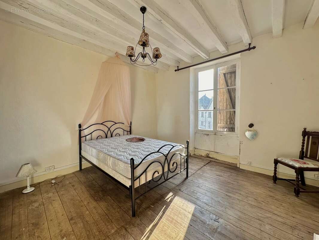 Charmante maison située en plein cœur du centre du village - photo 4