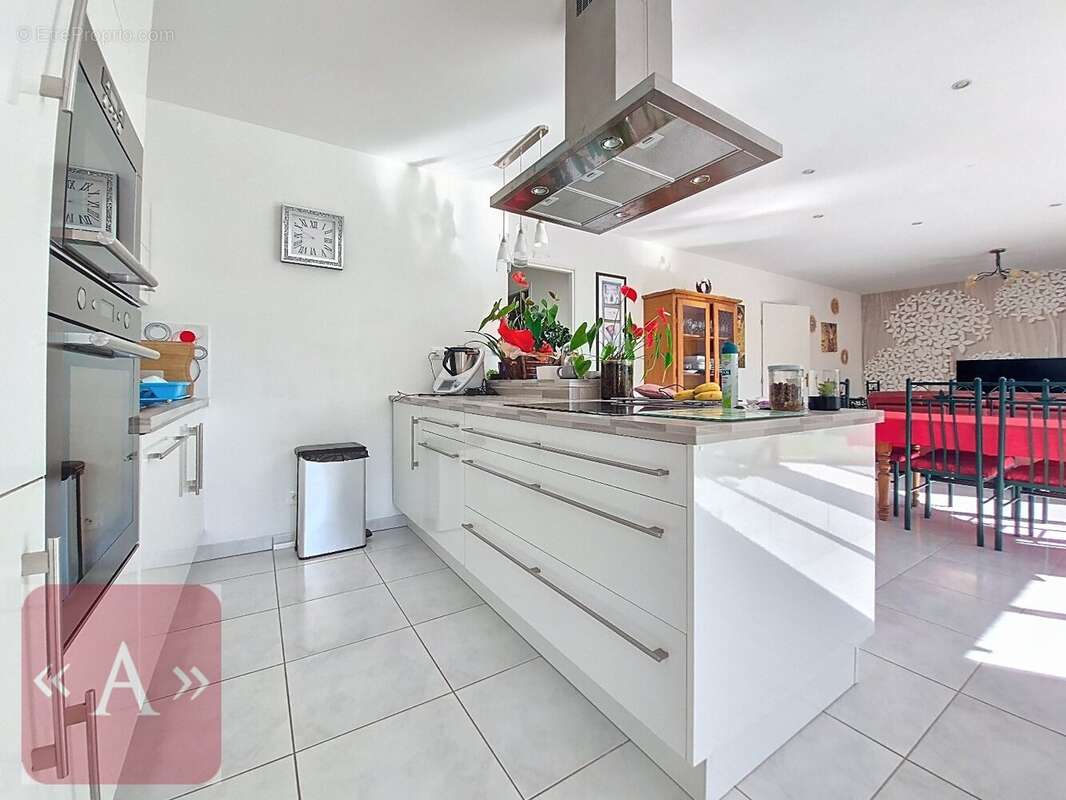 Maison de plain pied 120 m² - photo 5