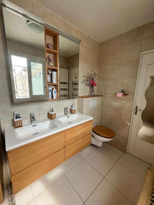 Maison de 7 pièces de 150 m² à Saint-Brice - photo 12
