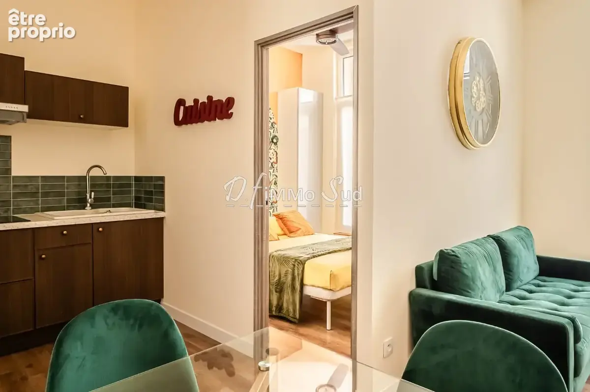 Appartement T2 bis en rez-de-chaussée en centre-ville - photo 5