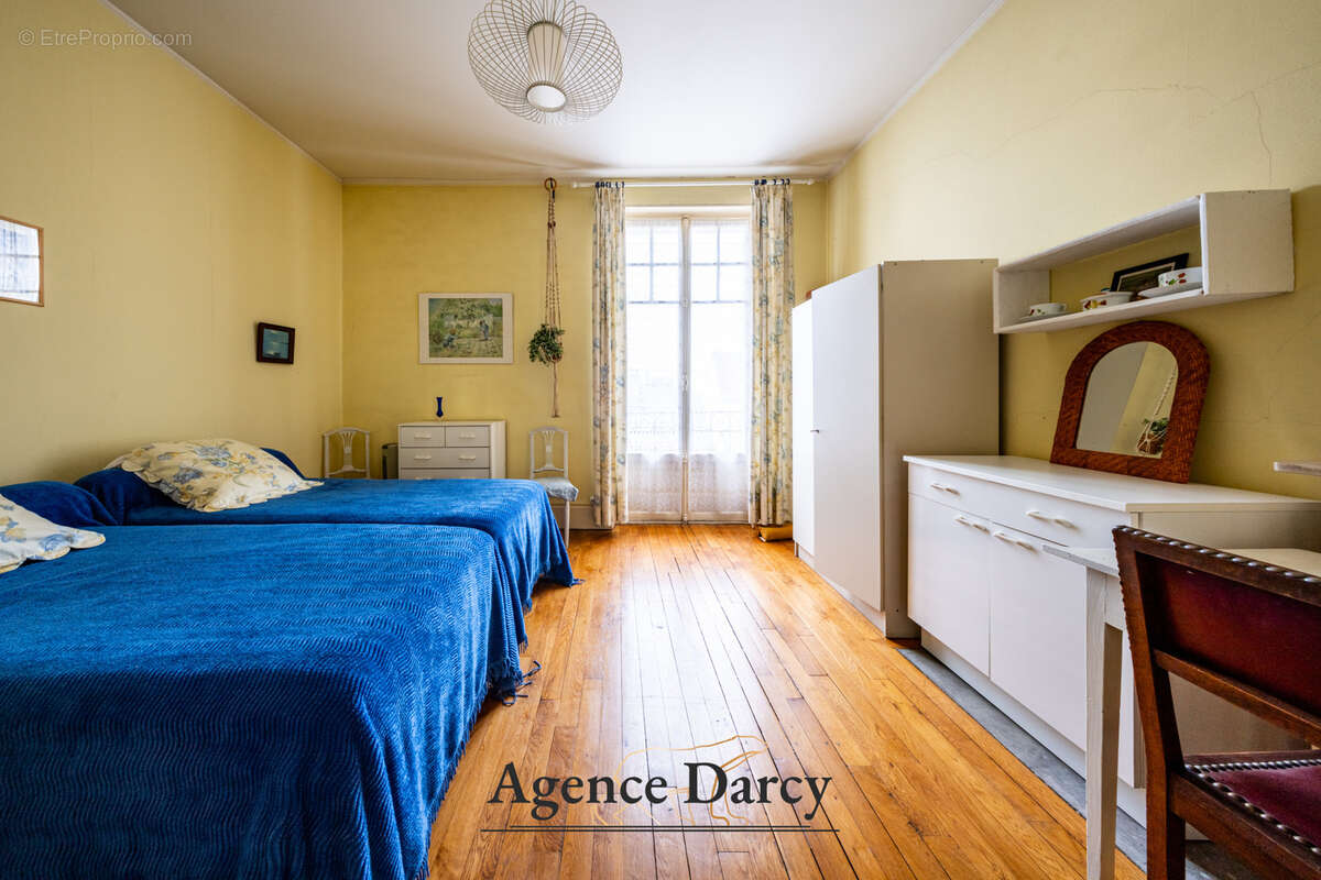 Appartement au dernier étage avec ascenseur, à deux pas de la place Darcy - photo 8
