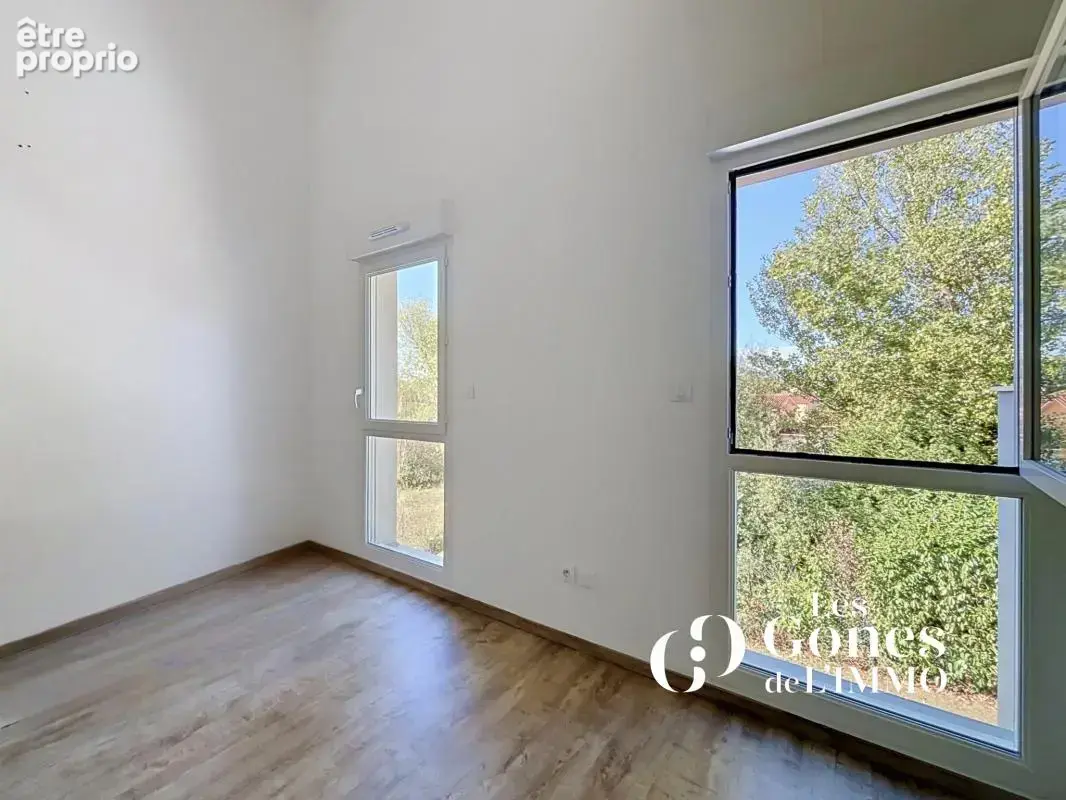 CRAPONNE   Un duplex familial de 102 m2 avec 3 chambres et d - photo 12