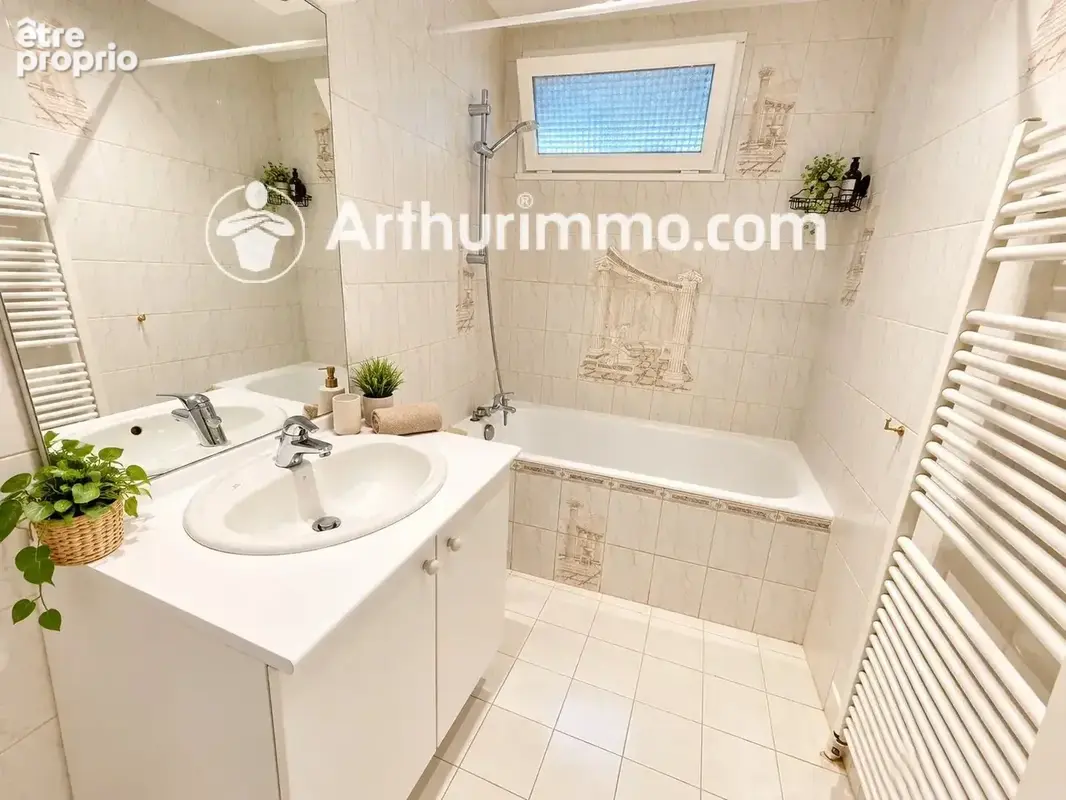 Appartement T4 de 75 m² avec garage double, cave et balcon – Grigny (69520) - photo 4
