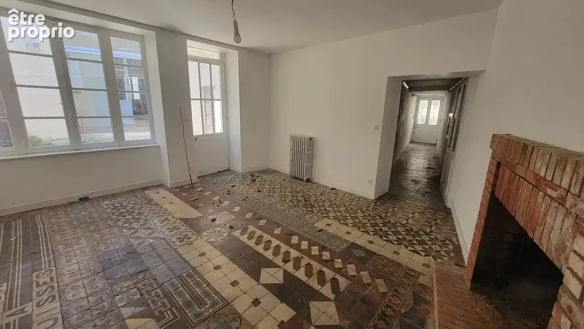 Au coeur du centre ville - grande maison de ville offrant quatre chambres, une courette, cave et dépendance - photo 17