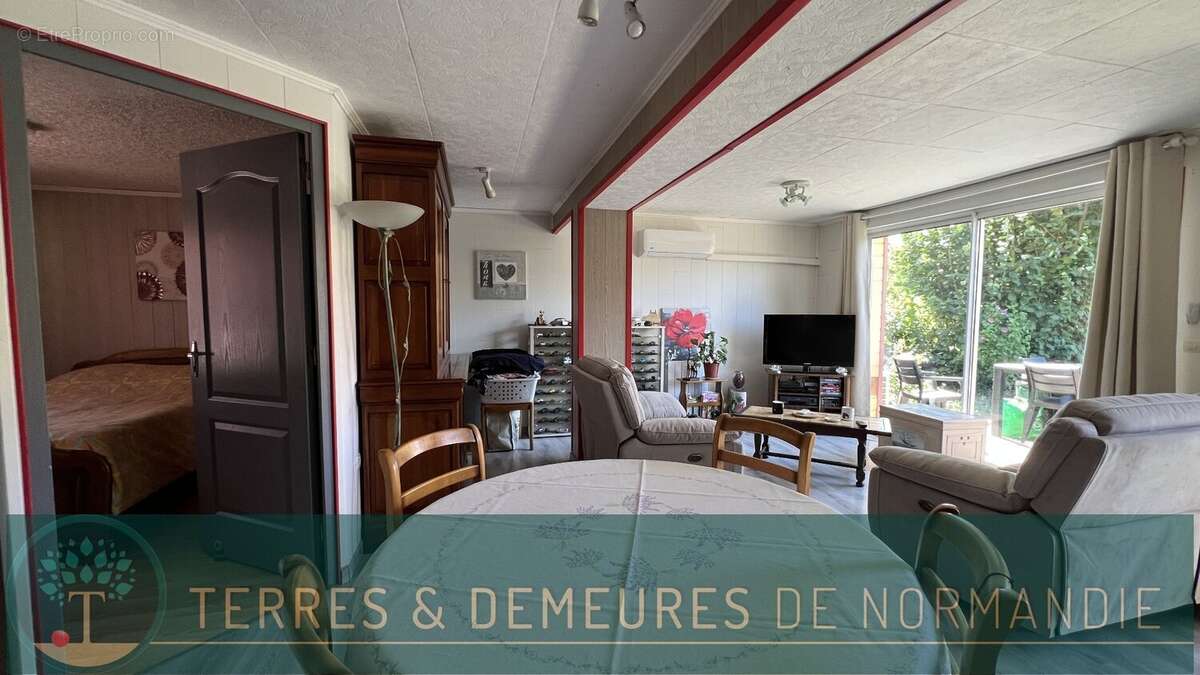 A vendre Propriété touristique de charme au cur de la campagne normande, offrant un cadre paisible et un fort potentiel d'activ - photo 19