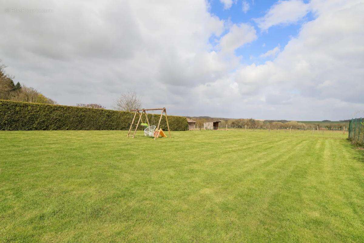 Maison de 170 m² à Tartigny avec jardin spacieux - photo 16