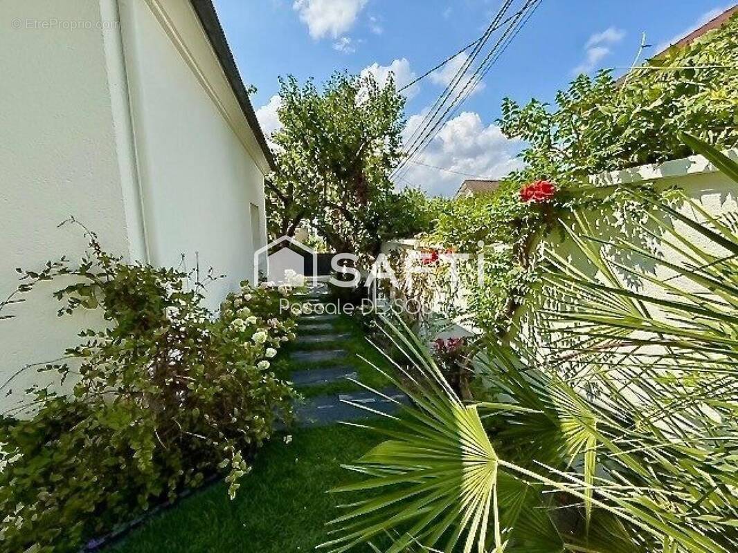 Photo 1 - Maison à RUEIL-MALMAISON