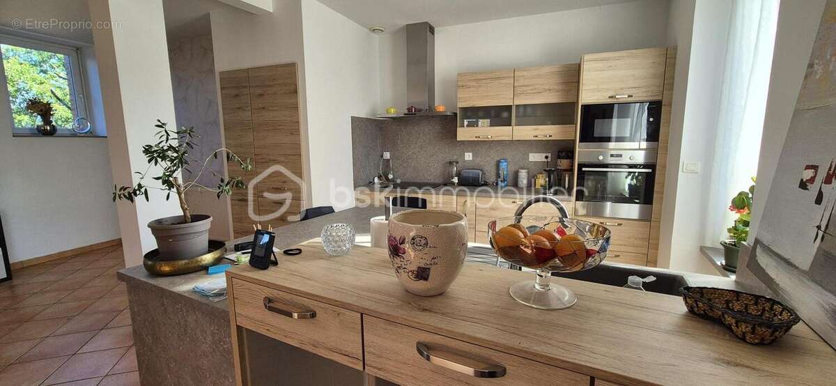 Maison familiale en pierre 161m2 avec 5 chambres, jardin arboré et vie tout à pied à Javené - photo 5