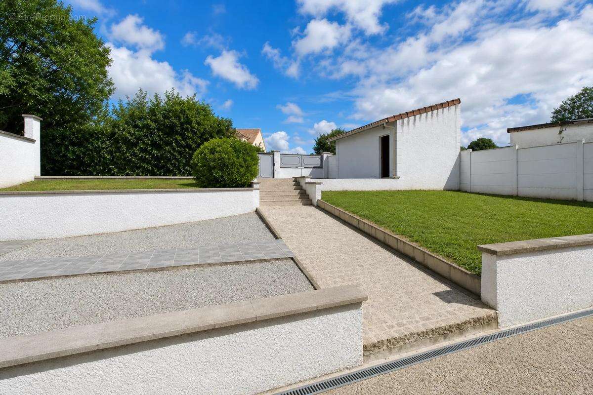 Maison de 5 pièces de 143 m² à Linas - photo 15