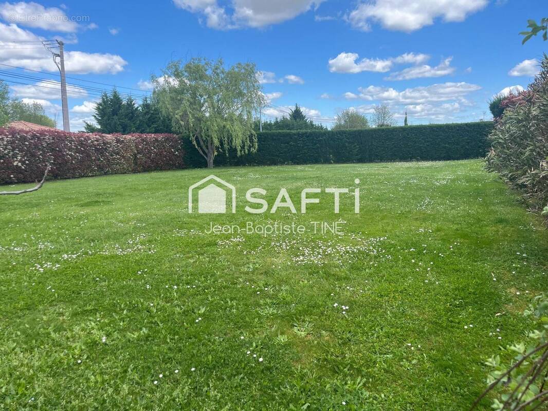 Photo 1 - Terrain à MONTBETON
