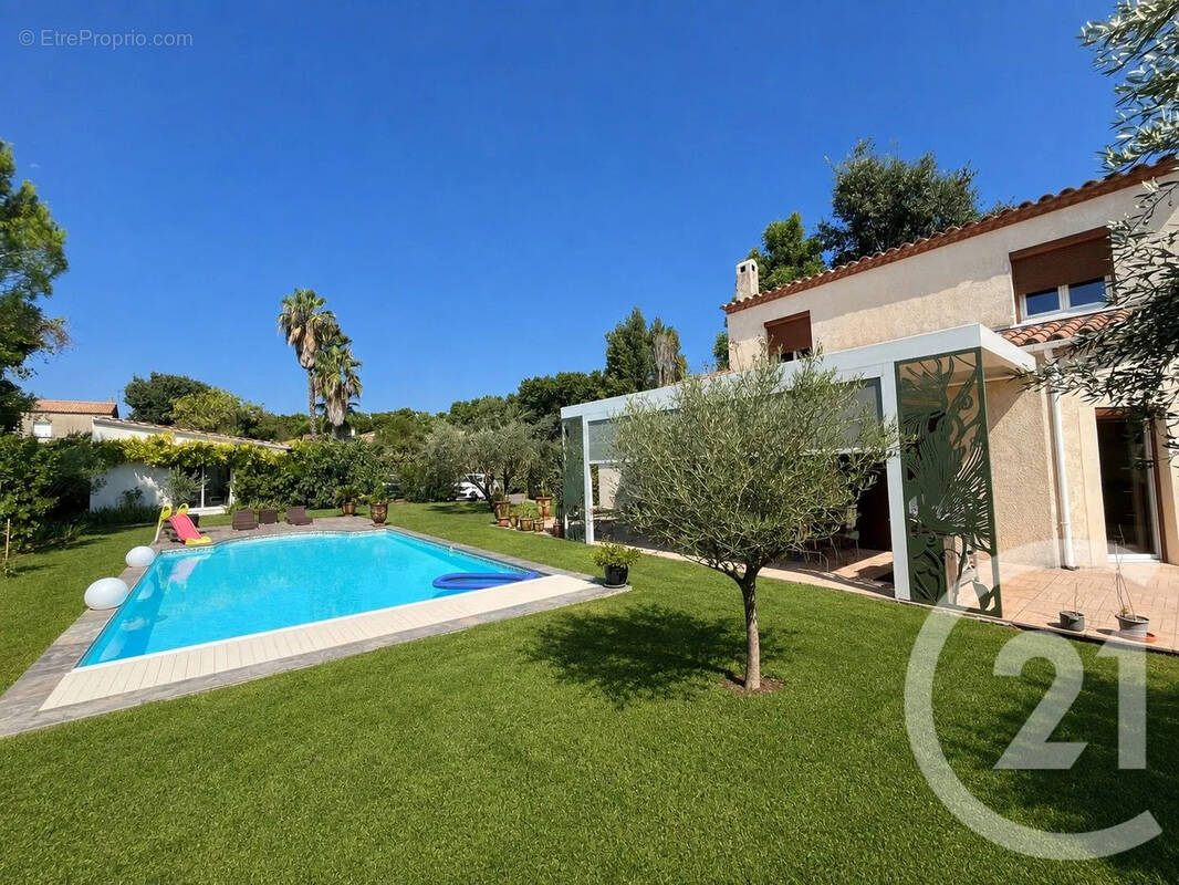 Maison 140 m² à Saint-Drezery  - photo 1