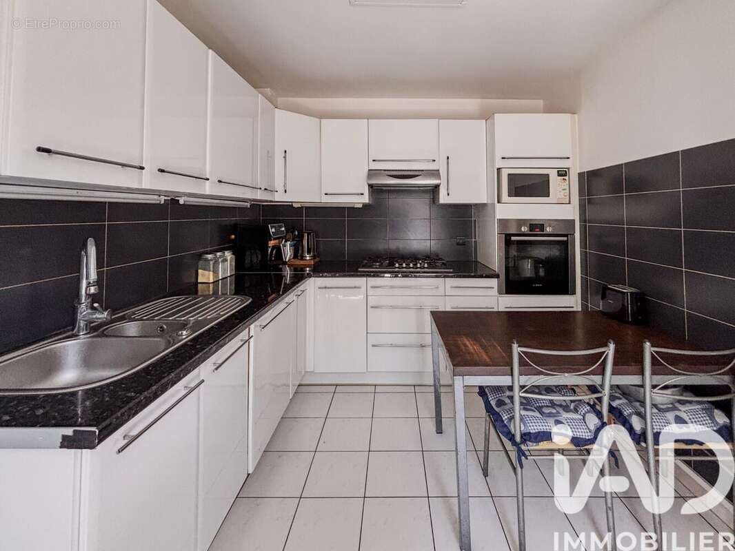 Photo 5 - Maison à CORMEILLES-EN-PARISIS