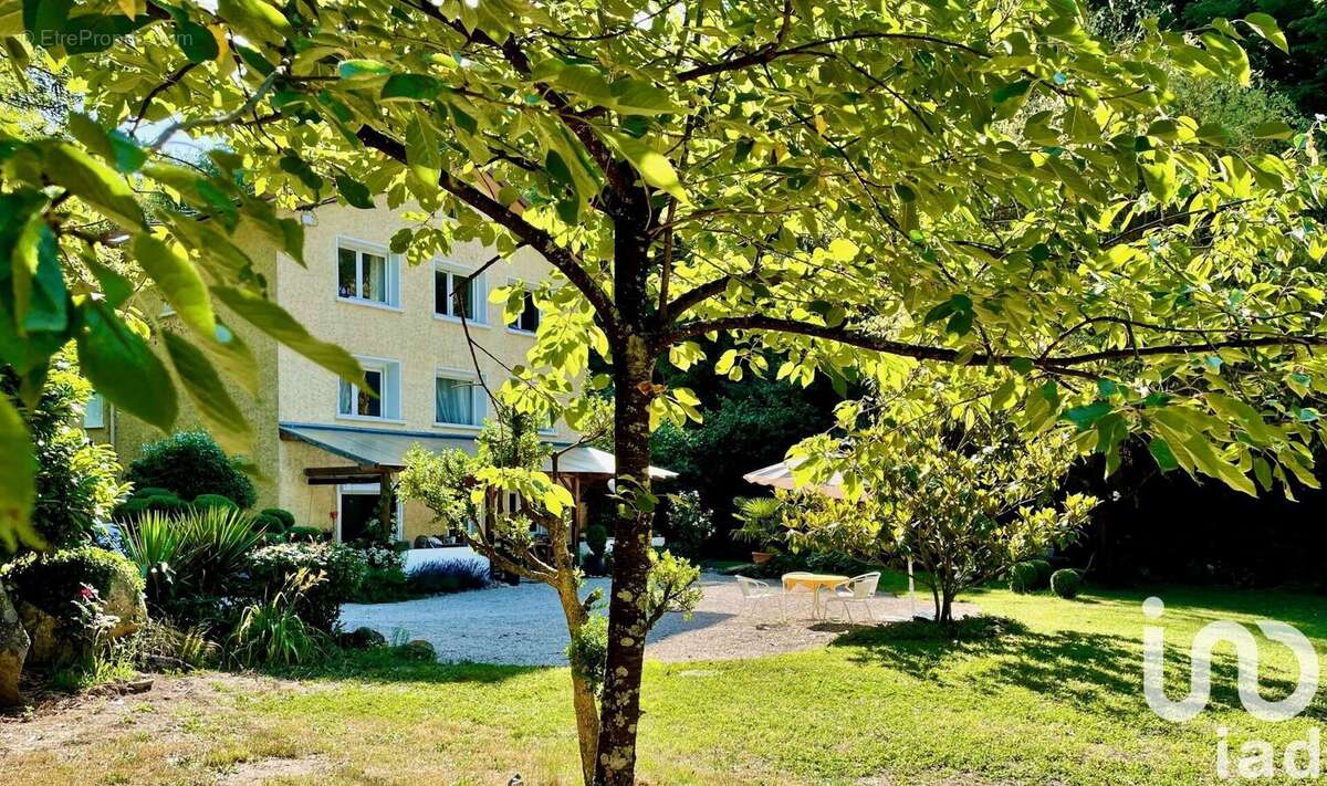 Photo 2 - Maison à SAINT-GENIS-LES-OLLIERES