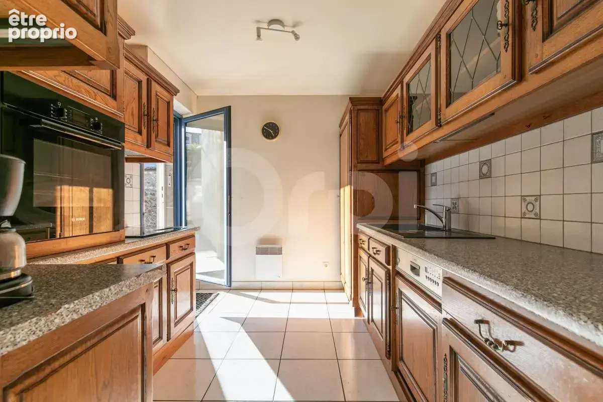 Le Perreux-sur-Marne – Appartement de 98 m² avec jardin privatif de 400 m² et un double box sécurisé - photo 5