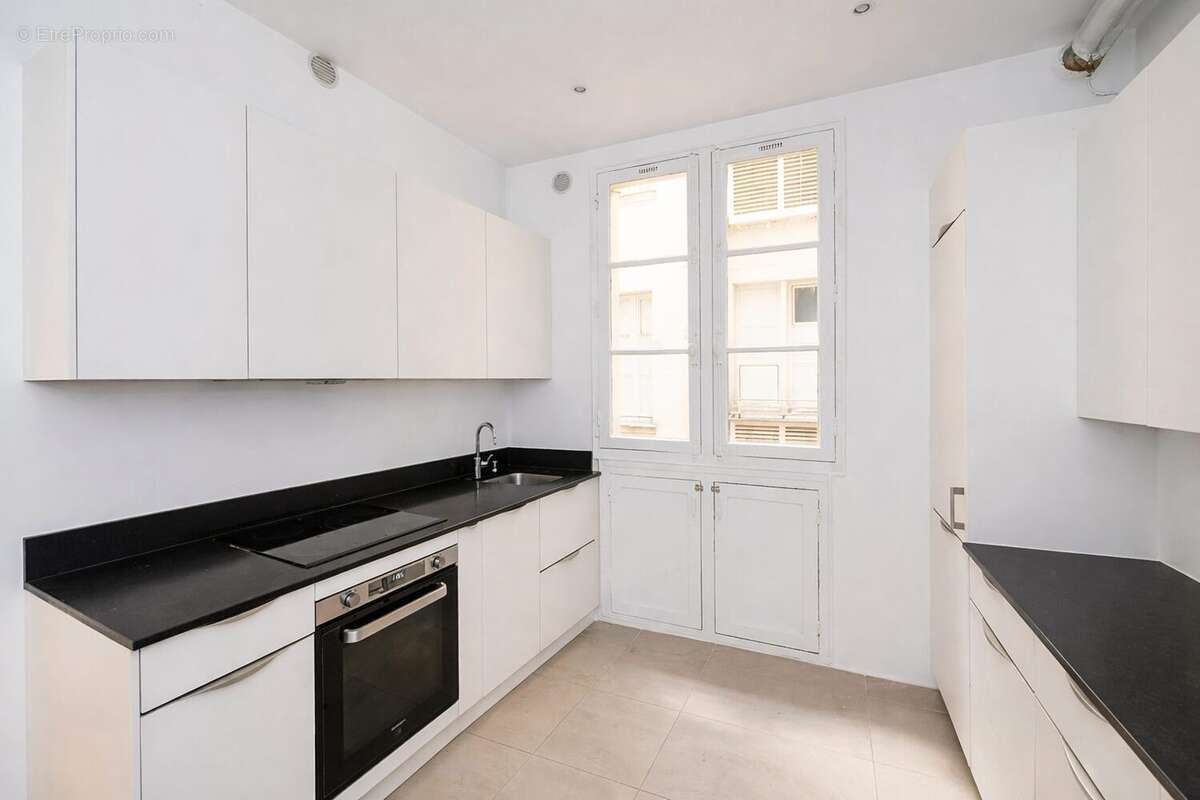 Appartement 100 m² à Paris-16e  - photo 4