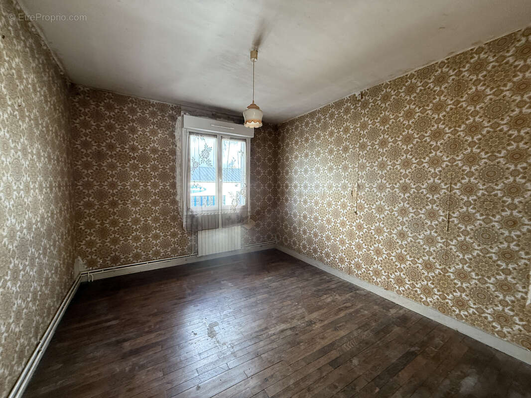 Maison à JUVIGNY-LE-TERTRE