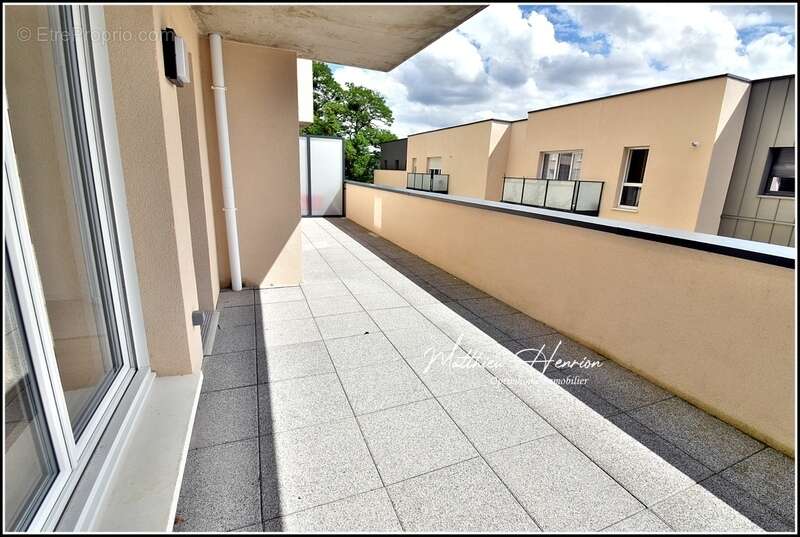 À Rouen Rive Droite, un appartement de 2023 avec terrasse et parking en sous-sol, DPE C - photo 14