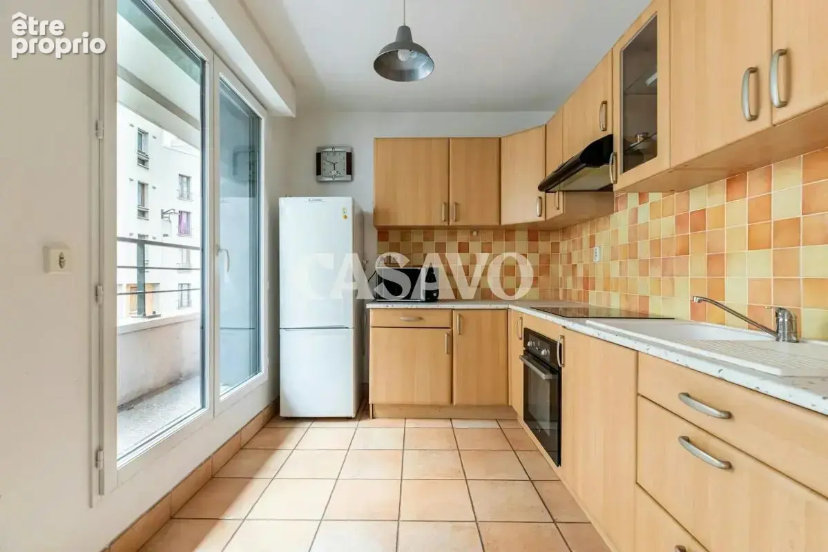 Vente Appartement 2 pièces de 51m² - 75018 Paris - photo 4