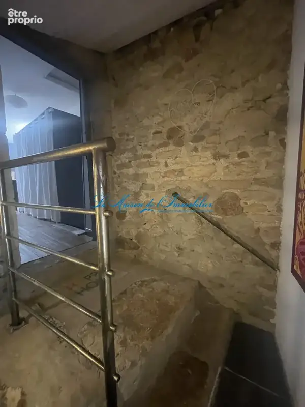 ST CHRISTOL LES ALES, maison en pierres F5 avec dépendances, chalet, piscine sur 2482 m2 de terrain avec puit - photo 11