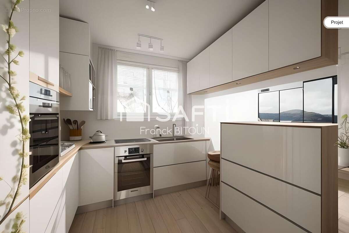 Photo 3 - Appartement à COURBEVOIE