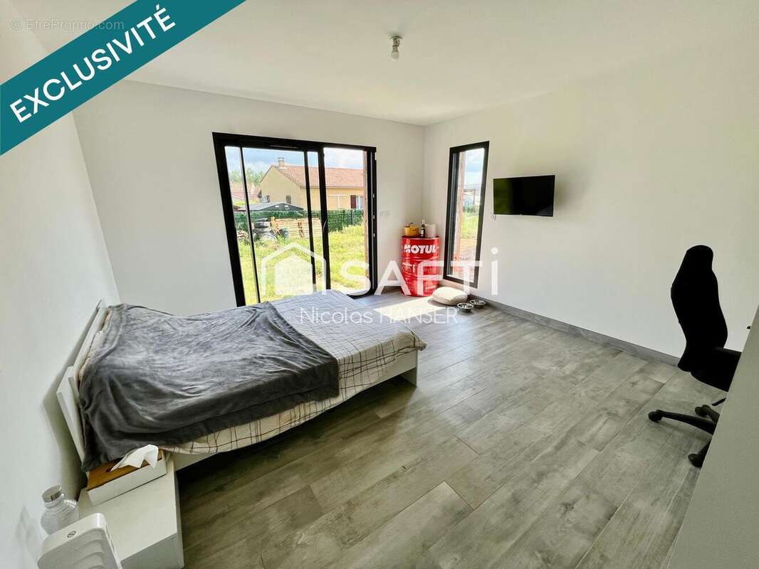 Photo 3 - Maison à SAINT-JULIEN-LES-ROSIERS