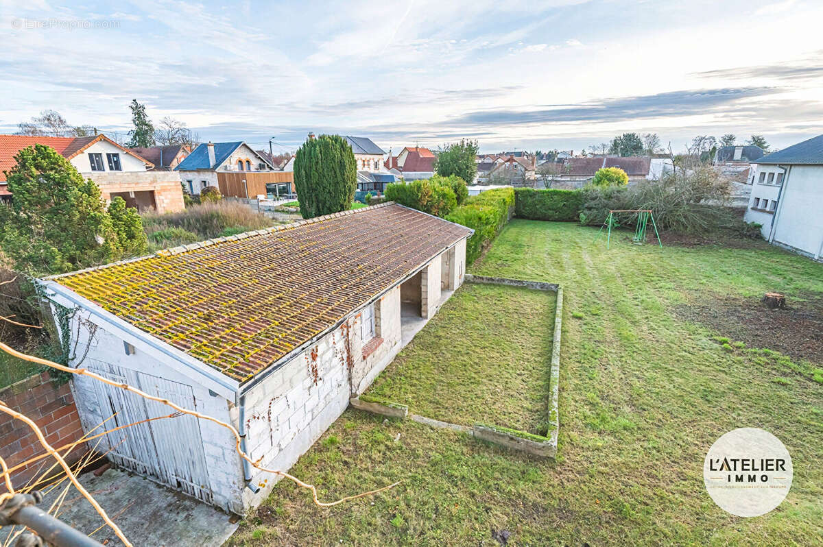 Maison à GUIGNICOURT
